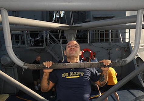 Sailor does pull-ups during a military workout to optimize fitness   U S  Navy photo by Mass Communication Specialist 3rd Cla