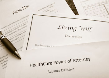 Papers titled will  living will  and healthcare power of attorney show how military members manage stress before deployments