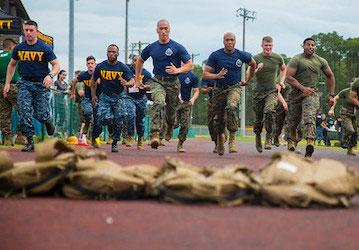 U S  Marines and sailors compete in the first annual Commanding General   s Fitness Cup Challenge in an effort to promote a h