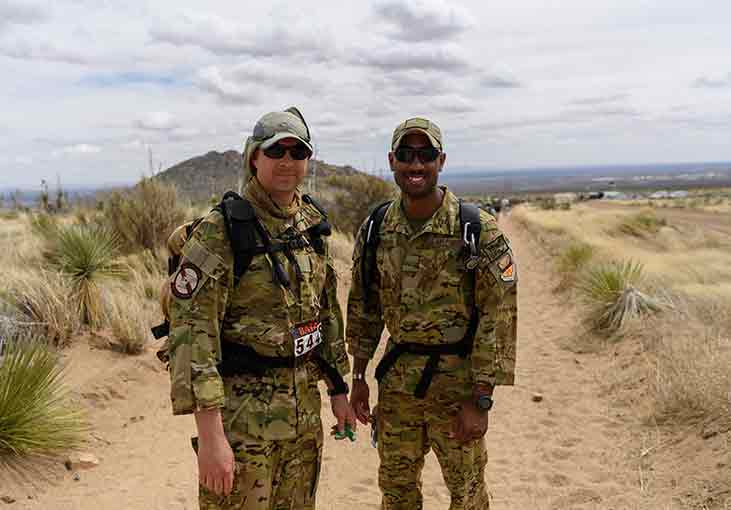 smiling men in uniform