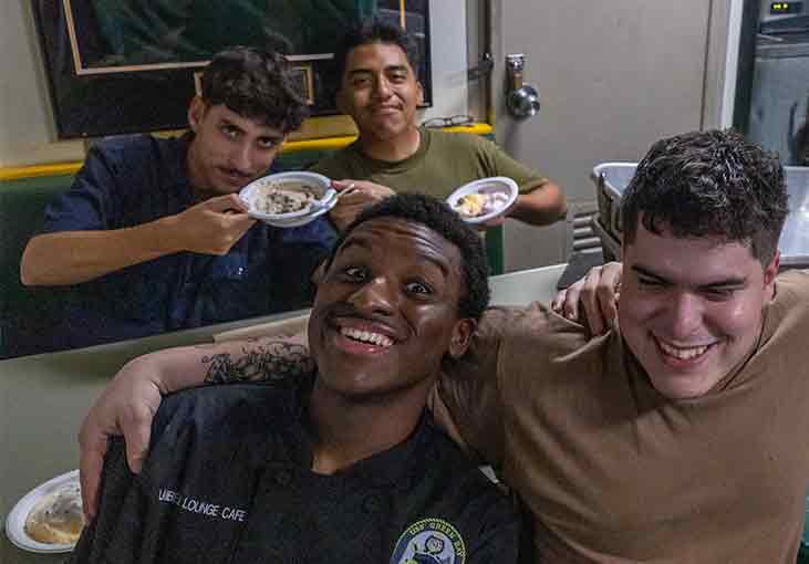 U S  Navy sailors enjoying ice cream and friends